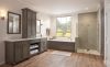 DELTA Dryden Roman Tub with Hand Shower Trim — Stainless