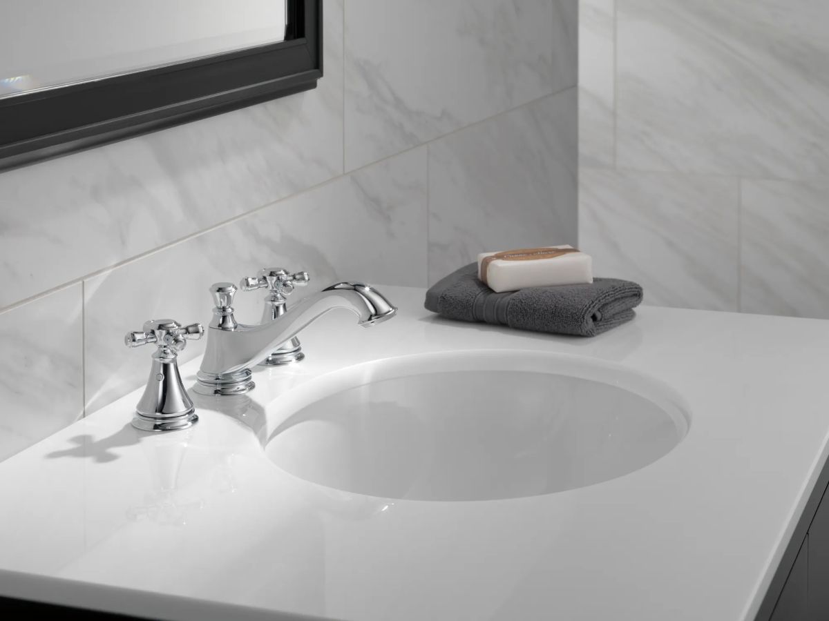DELTA Cassidy Two Handle Widespread Bathroom Faucet - Low Arc Spout - Less Handles — Chrome