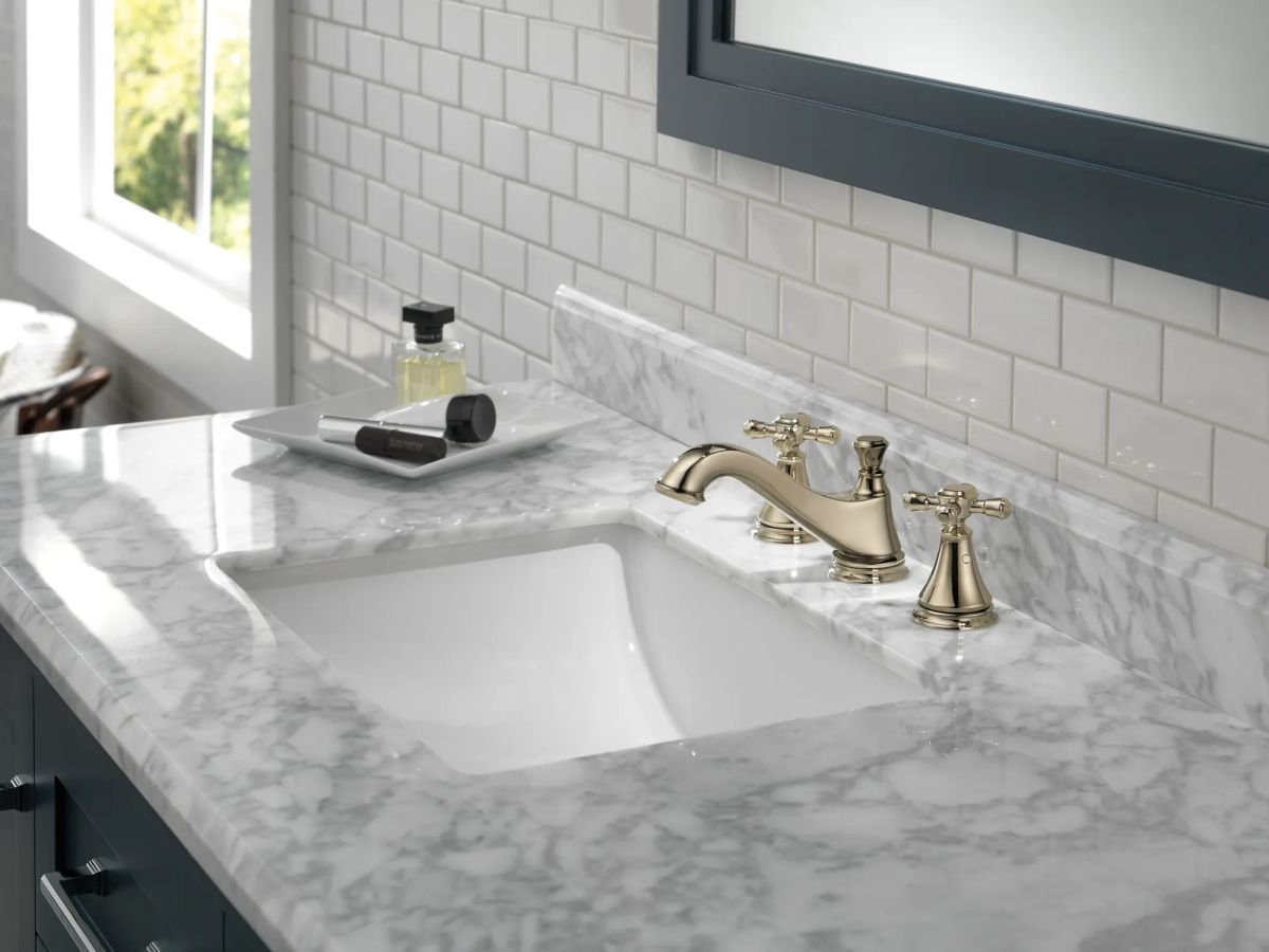 DELTA Cassidy Two Handle Widespread Bathroom Faucet - Low Arc Spout - Less Handles — Polished Nickel