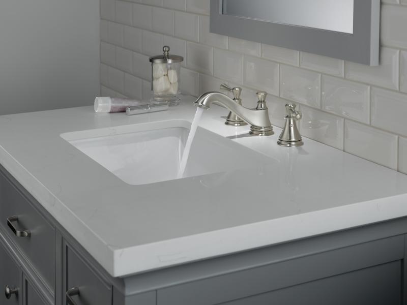 DELTA Cassidy Two Handle Widespread Bathroom Faucet - Low Arc Spout - Less Handles — Stainless