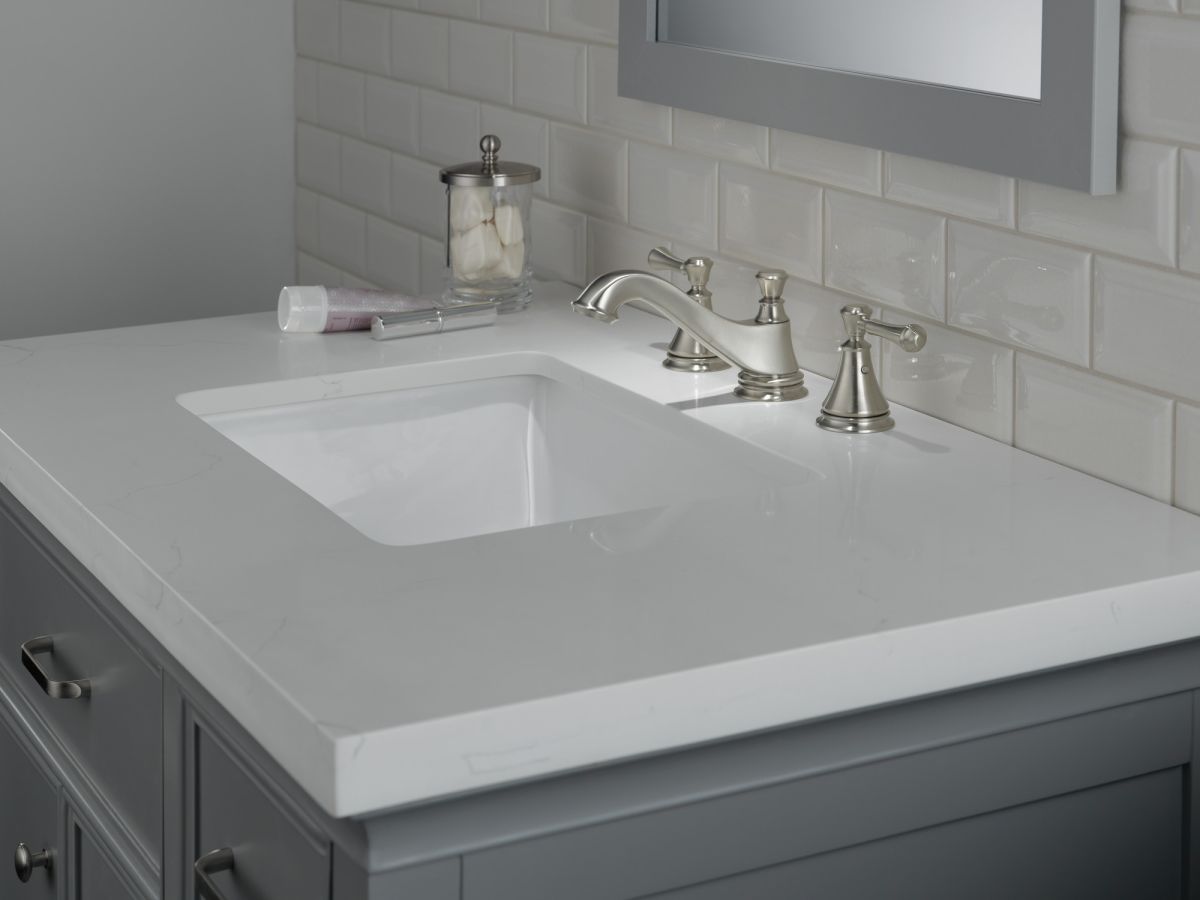 DELTA Cassidy Two Handle Widespread Bathroom Faucet - Low Arc Spout - Less Handles — Stainless