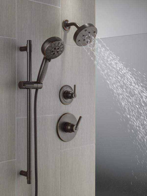 DELTA Universal Showering Components 7-Setting Slide Bar Hand Shower with Cleaning Spray — Venetian Bronze