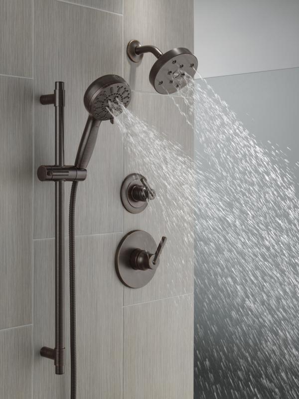DELTA Universal Showering Components 7-Setting Slide Bar Hand Shower with Cleaning Spray — Venetian Bronze
