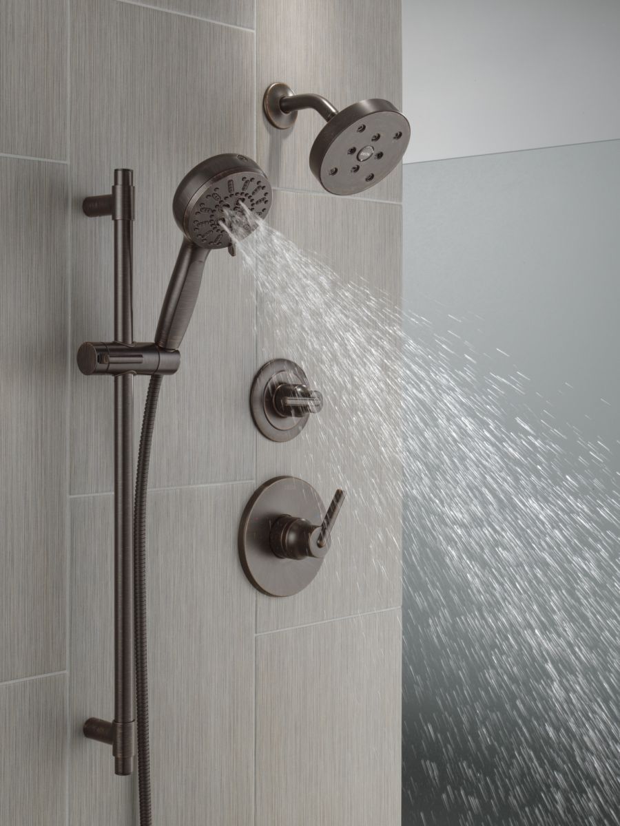 DELTA Universal Showering Components 7-Setting Slide Bar Hand Shower with Cleaning Spray — Venetian Bronze