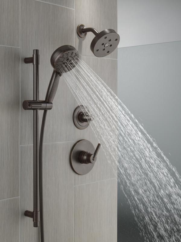 DELTA Universal Showering Components 7-Setting Slide Bar Hand Shower with Cleaning Spray — Venetian Bronze