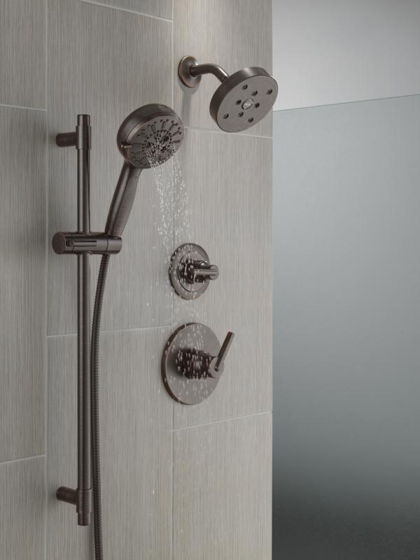 DELTA Universal Showering Components 7-Setting Slide Bar Hand Shower with Cleaning Spray — Venetian Bronze