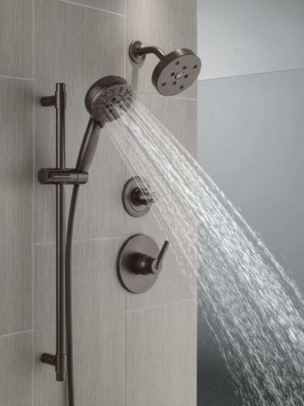 DELTA Universal Showering Components 7-Setting Slide Bar Hand Shower with Cleaning Spray — Venetian Bronze