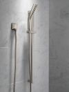 DELTA Universal Showering Components H2OKINETIC 3-Setting Slide Bar Hand Shower — Stainless