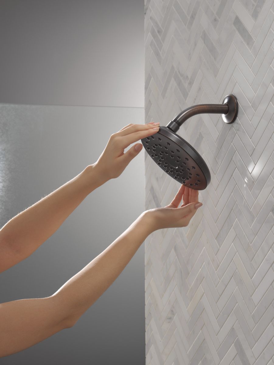 DELTA Universal Showering Components PivotPro Raincan Shower Head — Venetian Bronze