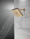 DELTA Universal Showering Components H2Okinetic 4-Setting Shower Head with Ultrasoak — Champagne Bronze