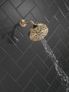 DELTA Universal Showering Components H2OKINETIC 5-Setting Contemporary Raincan Shower Head — Lumicoat® Champagne Bronze