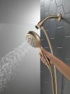 DELTA Universal Showering Components 7-Setting SureDock Magnetic Hand Shower — Champagne Bronze