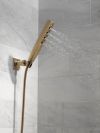 DELTA Universal Showering Components H2OKINETIC 4-Setting Wall Mount Hand Shower — Lumicoat® Champagne Bronze