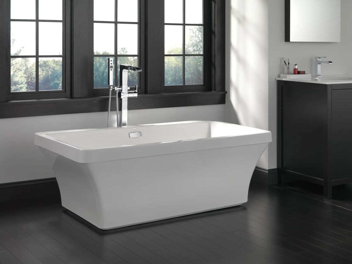 DELTA Ara Single Handle Floor Mount Channel Spout Tub Filler Trim with Hand Shower — Chrome