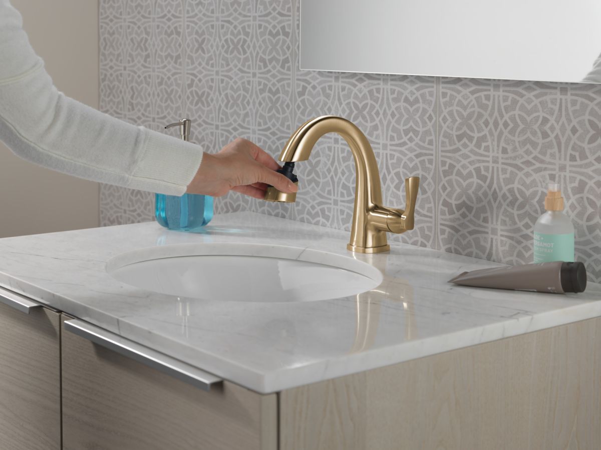 DELTA Stryke Single Handle Pull Down Bathroom Faucet — Lumicoat® Champagne Bronze