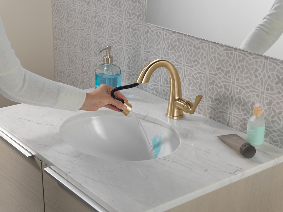 DELTA Stryke Single Handle Pull Down Bathroom Faucet — Lumicoat® Champagne Bronze