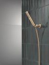 DELTA Universal Showering Components 2-Setting Hand Shower with ProClean Spray — Lumicoat® Champagne Bronze