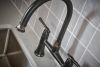 BRIZO Tulham Bridge Kitchen Faucet with Side Sprayer — Matte Black / Brilliance Black Onyx