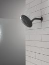 DELTA Universal Showering Components PivotPro Raincan Shower Head with TouchClean Spray Face — Matte Black