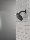 DELTA Universal Showering Components PivotPro Raincan Shower Head with TouchClean Spray Face — Matte Black