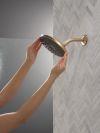 DELTA Universal Showering Components PivotPro Raincan Shower Head with TouchClean Spray Face — Champagne Bronze