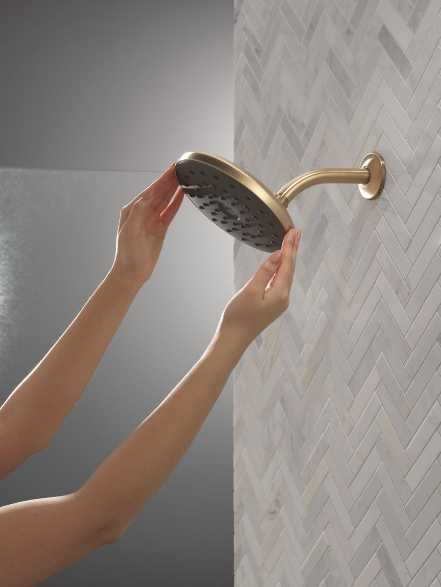 DELTA Universal Showering Components PivotPro Raincan Shower Head with TouchClean Spray Face — Champagne Bronze