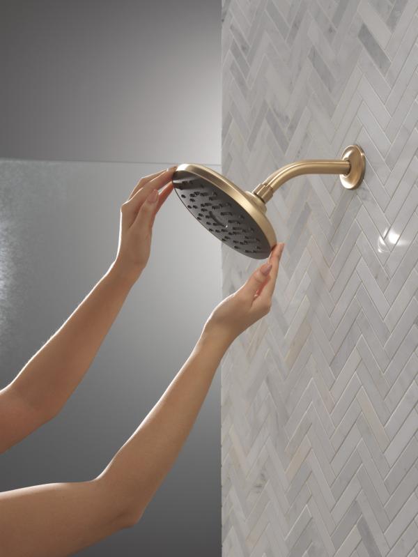 DELTA Universal Showering Components PivotPro Raincan Shower Head with TouchClean Spray Face — Champagne Bronze