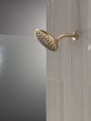 DELTA Universal Showering Components PivotPro Raincan Shower Head — Champagne Bronze
