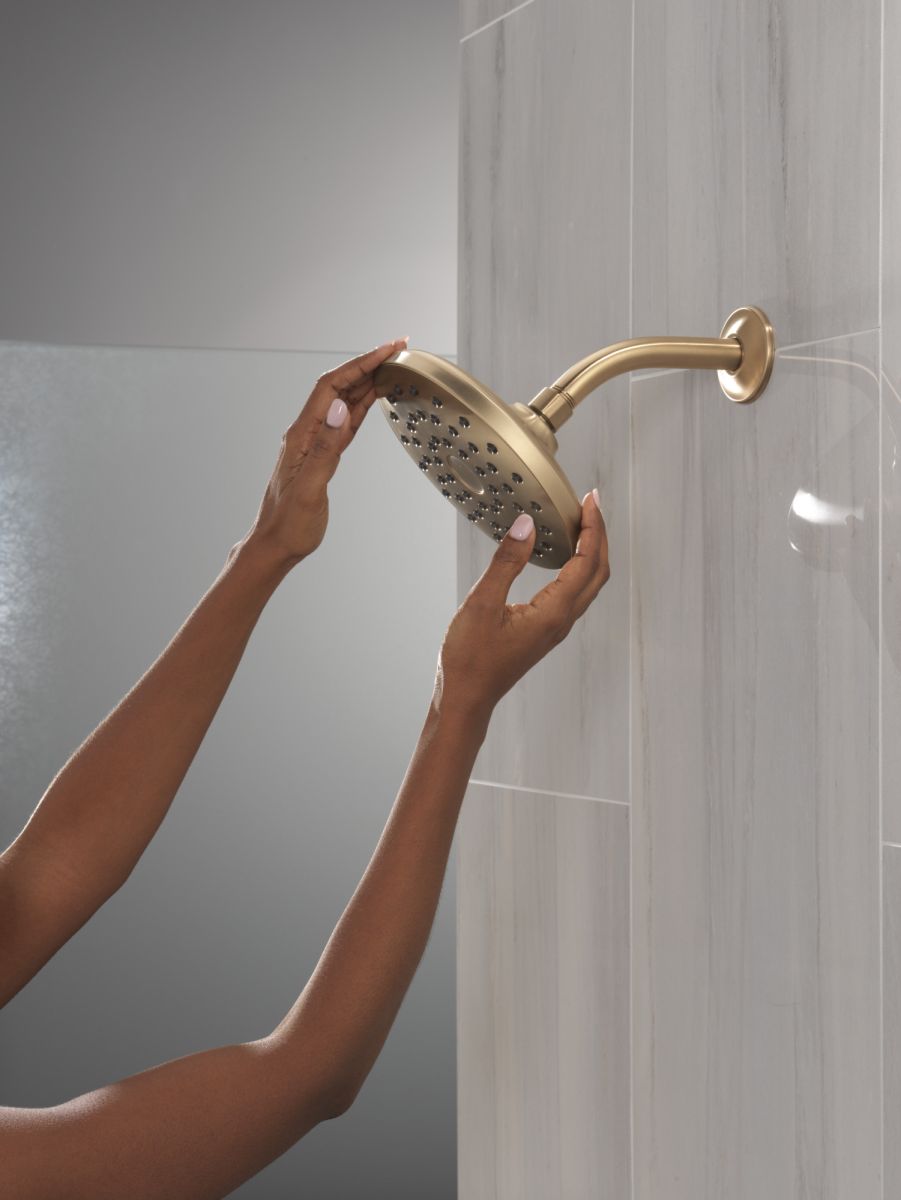 DELTA Universal Showering Components PivotPro Raincan Shower Head — Champagne Bronze