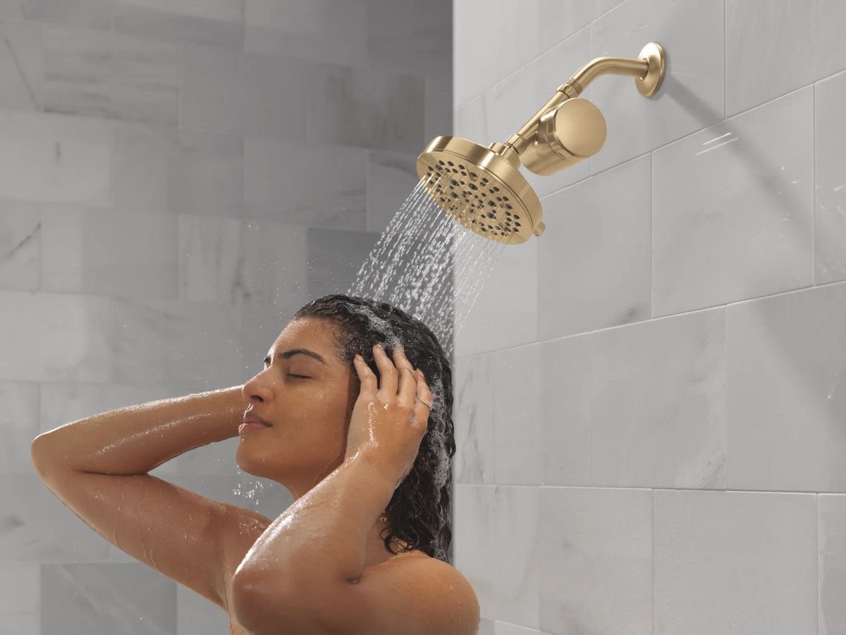 DELTA Universal Showering Components 5-Setting Showerhead — Champagne Bronze