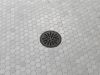 DELTA 4" Tile-In Round Shower Drain — Matte Black