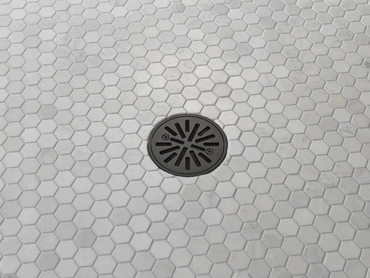 DELTA 4" Tile-In Round Shower Drain — Matte Black