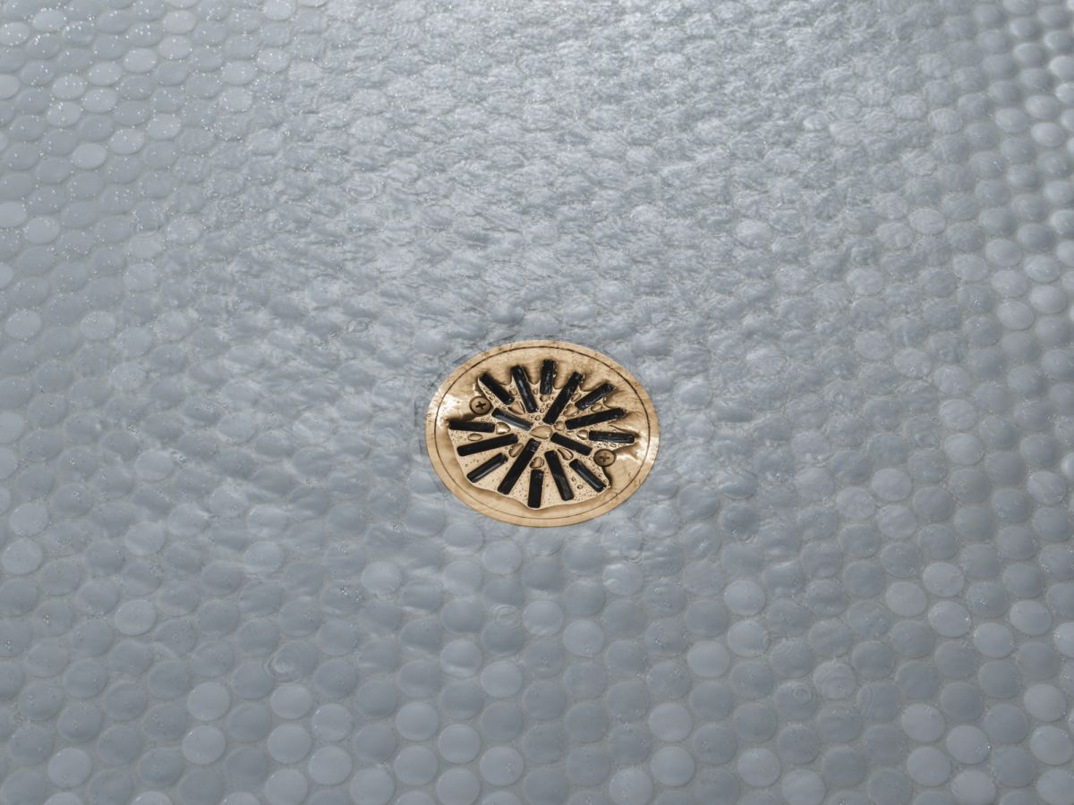 DELTA 4" Tile-In Round Shower Drain — Champagne Bronze