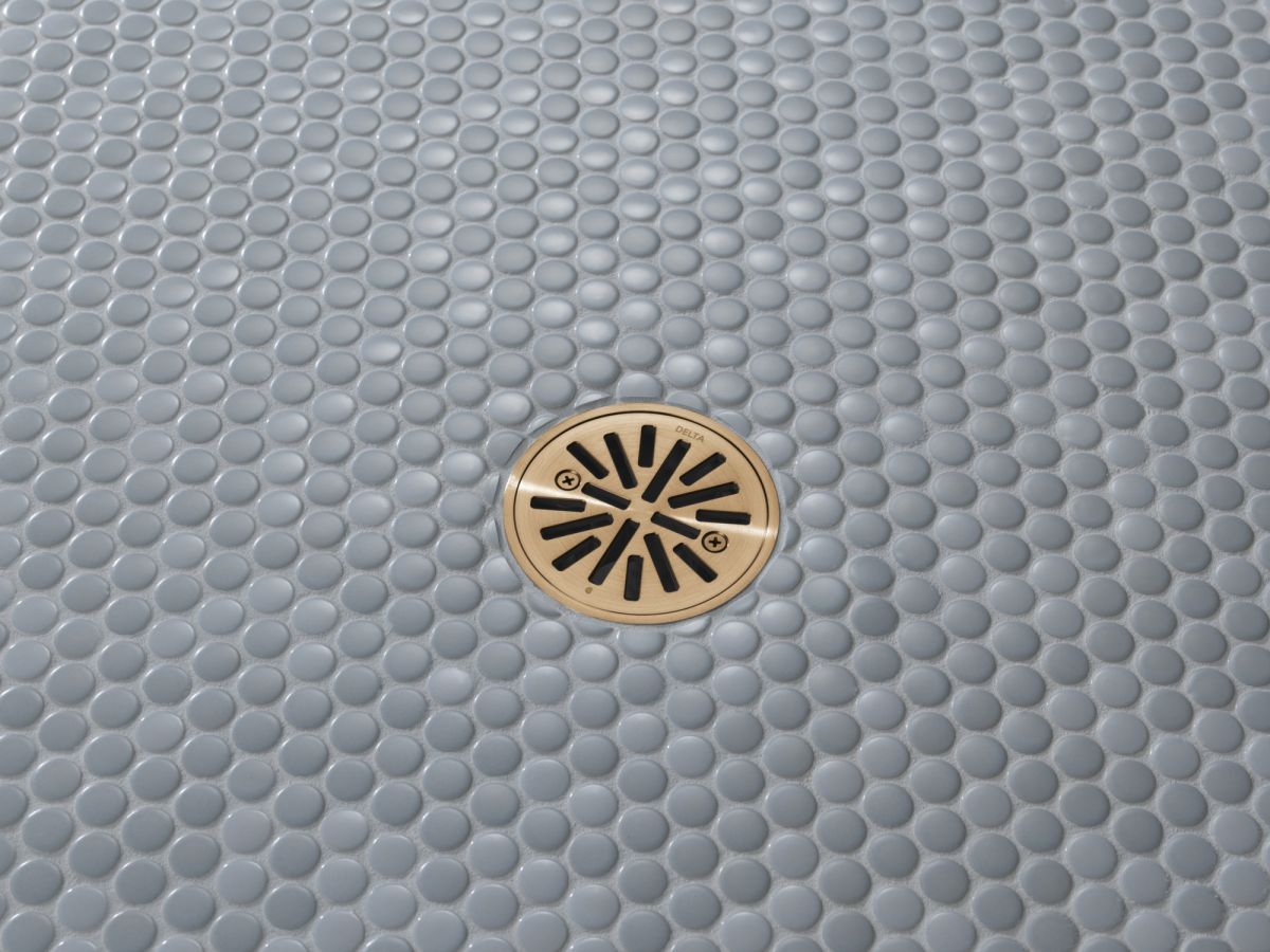 DELTA 4" Tile-In Round Shower Drain — Champagne Bronze