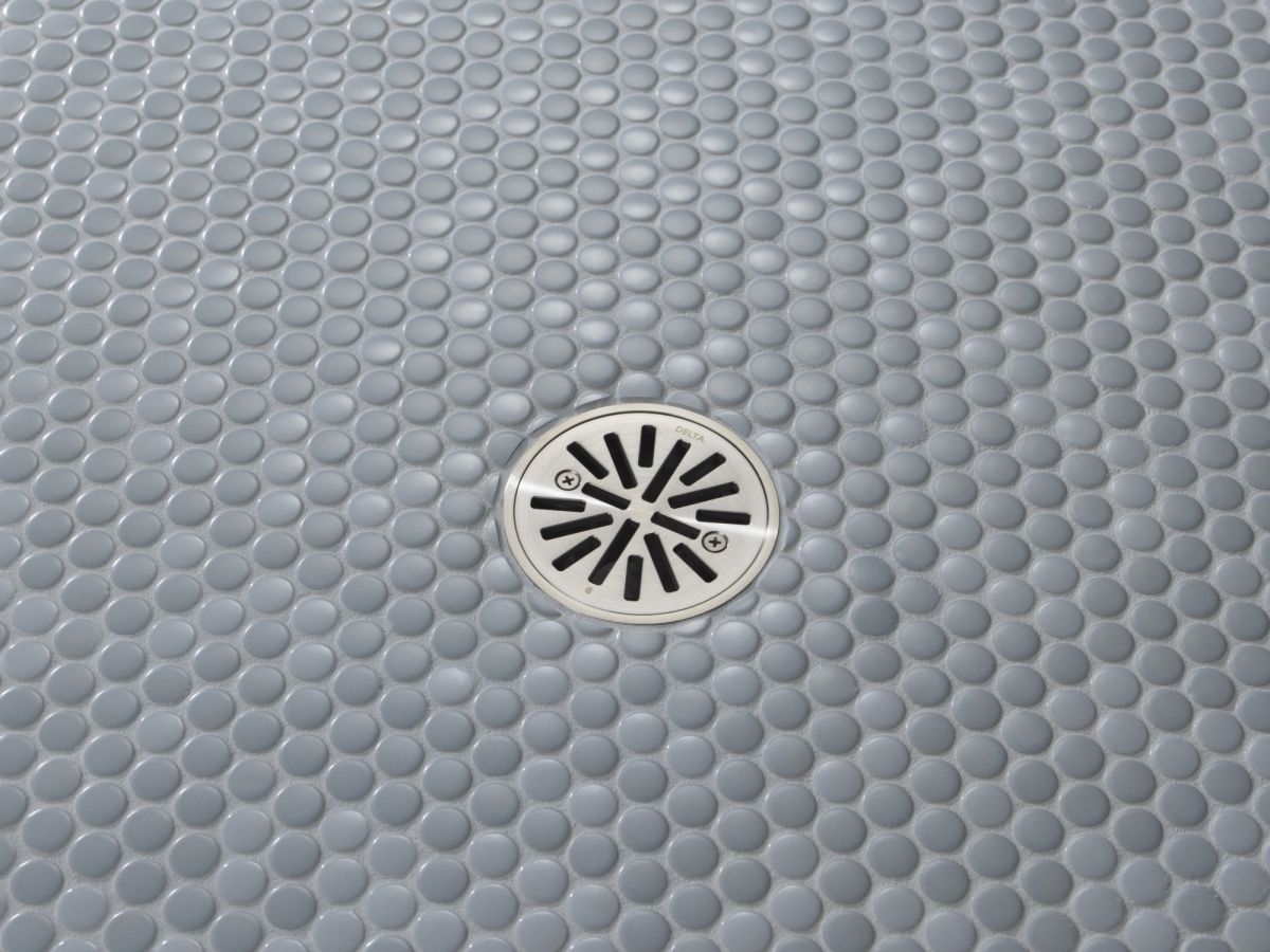 DELTA 4" Tile-In Round Shower Drain — Stainless