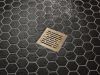 DELTA 4" Tile-In Square Shower Drain — Champagne Bronze