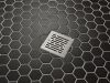 DELTA 4" Tile-In Square Shower Drain — Stainless