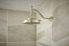 BRIZO Invari 7 5/8” H2Okinetic Round Multi-Function Shower Head - 2.5 GPM — Polished Nickel