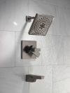 DELTA Trillian 17 Series H2Okinetic Tub Shower Trim — Lumicoat® Black Stainless