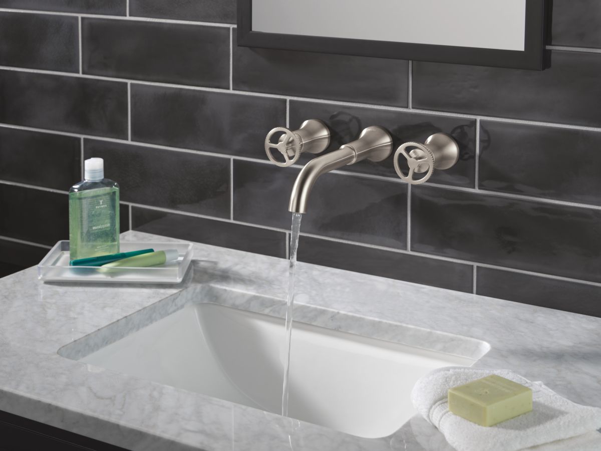 DELTA Trinsic Two Handle Wall Mount Bathroom Faucet — Stainless