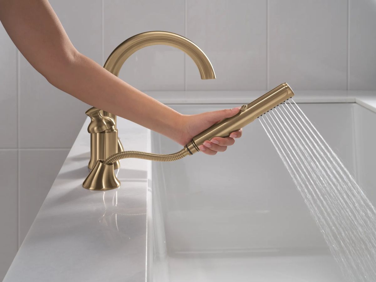 DELTA Bonacci Three Hole Roman Tub Trim with Hand Shower — Lumicoat® Champagne Bronze