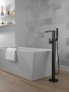 DELTA Ara Single Handle Floor Mount Tub Filler Trim with Hand Shower — Matte Black