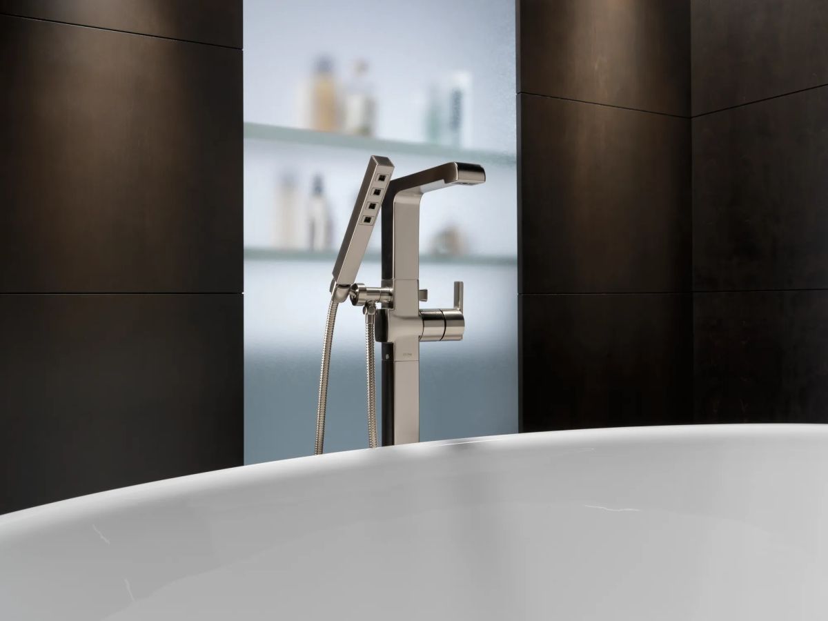 DELTA Ara Single Handle Floor Mount Tub Filler Trim with Hand Shower — Stainless