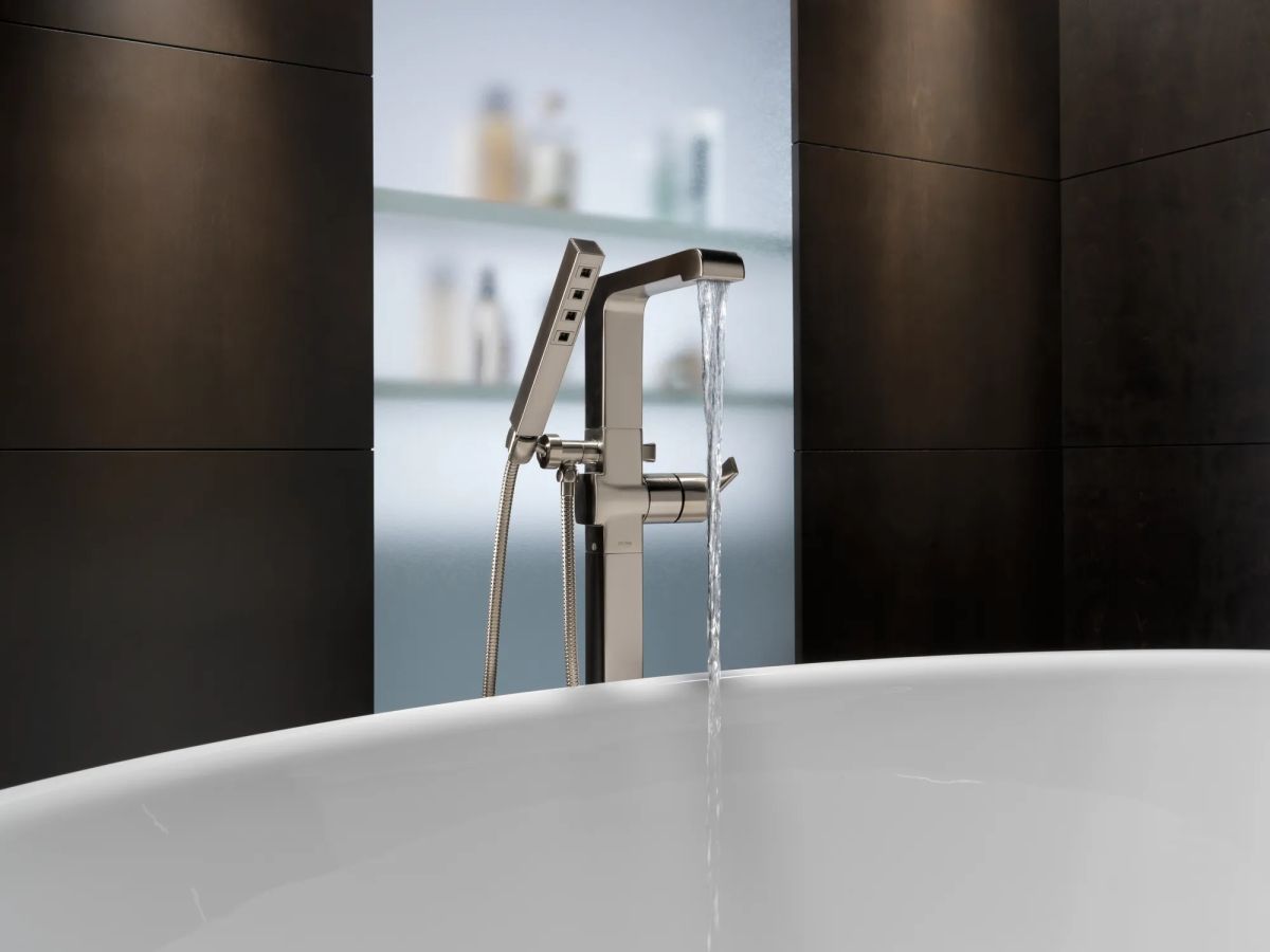 DELTA Ara Single Handle Floor Mount Tub Filler Trim with Hand Shower — Stainless