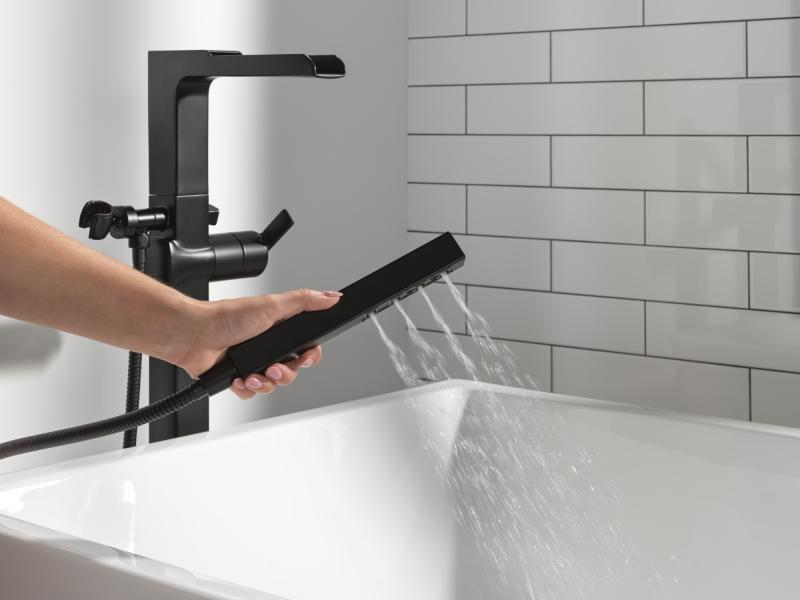 DELTA Ara Single Handle Floor Mount Channel Spout Tub Filler Trim with Hand Shower — Matte Black