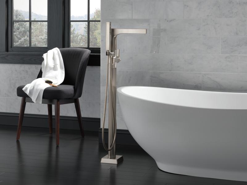 DELTA Zura Single Handle Floor Mount Tub Filler Trim with Hand Shower — Stainless