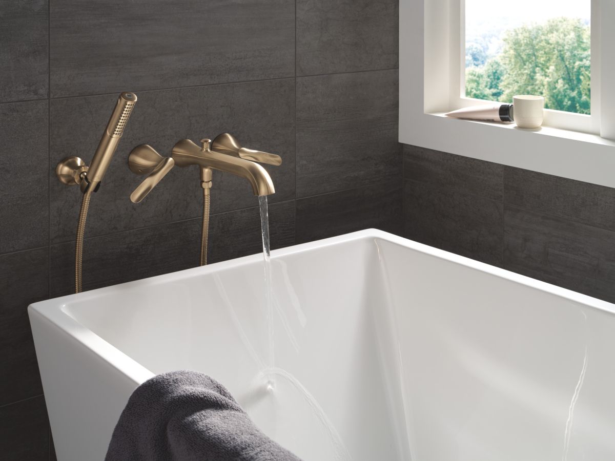 DELTA Bonacci Two Handle Wall Mount Tub Filler Trim with Hand Shower — Lumicoat® Champagne Bronze