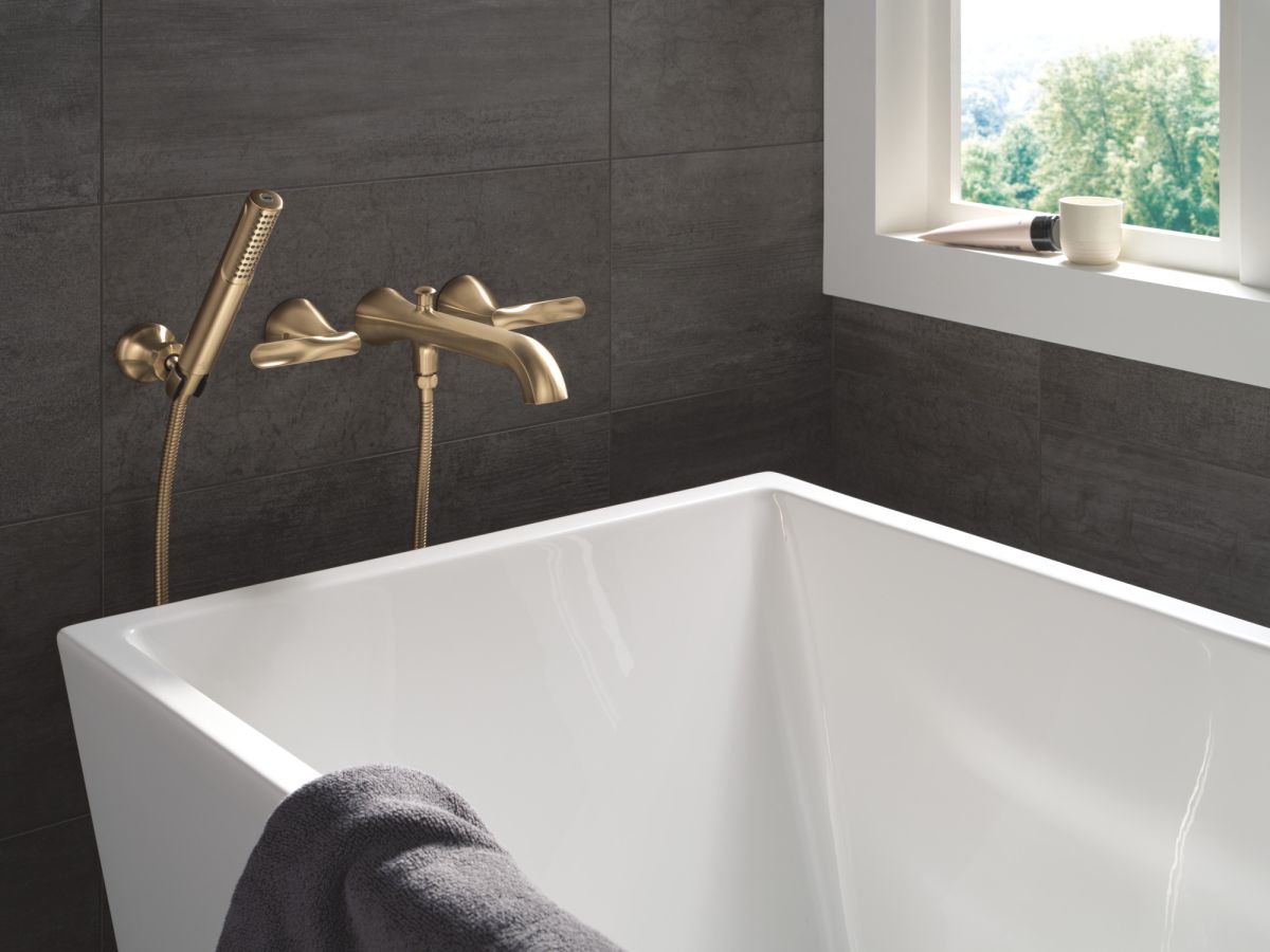 DELTA Bonacci Two Handle Wall Mount Tub Filler Trim with Hand Shower — Lumicoat® Champagne Bronze