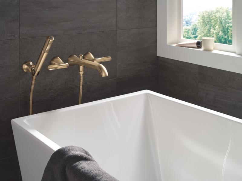 DELTA Bonacci Two Handle Wall Mount Tub Filler Trim with Hand Shower — Lumicoat® Champagne Bronze